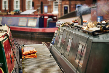 Colorful boats, houses on the water in the canals of Birmingham - Powered by Adobe