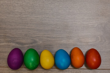 Traditional painted Easter eggs on wooden background. Colorful background of Easter eggs collection, Easter celebration
