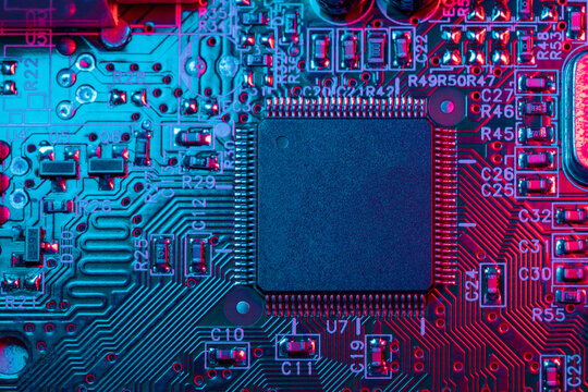 Digital Microprocessor. Computer Controller Circuit Board closeup Main Central Processing Unit Electronic Chips with Data Signal Lane.