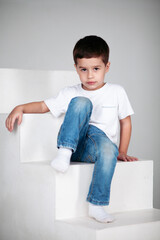 boy in white t-shirt and socks