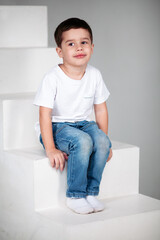 boy in white t-shirt and socks
