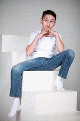 boy in white t-shirt and jeans