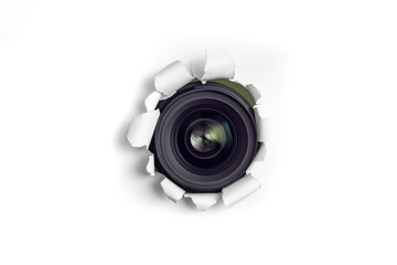 Camera lens taking pictures thru a torn hole