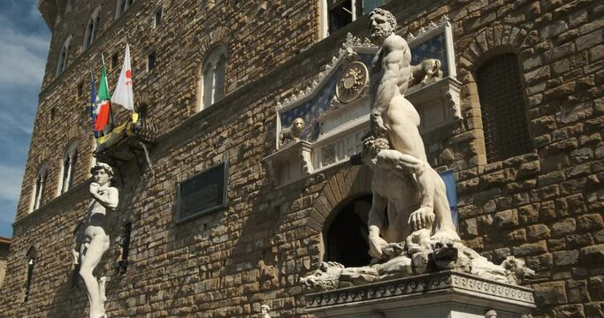 David Michelangelo. Michelangelo's David and Hercules and Cacus.Sculptures in front of the Palazzo Vecchio in Florence on the Piazza della Signoria. 