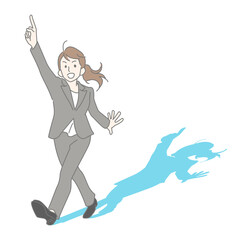 人差し指を掲げて歩くスーツを着た笑顔の女性