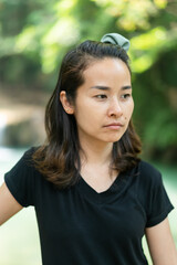 Portrait smiling young Asian woman.