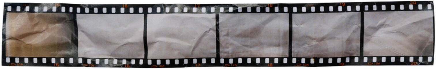 single long 35mm film dia strip printed on white crumpled paper, contact sheet with empty frames or...