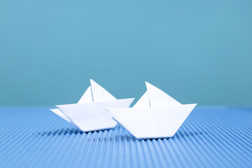 Concept of travel and adventure with paper boats