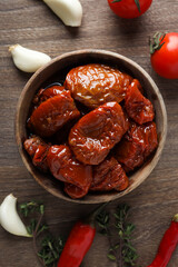 Concept of tasty food - sun-dried tomato, top view