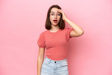 Young Ukrainian woman isolated on pink background has realized something and intending the solution