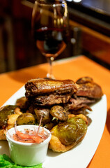 Baked guinea pig in peru with wine