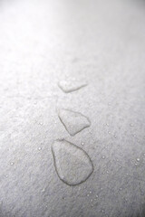 Water drops on metallic background