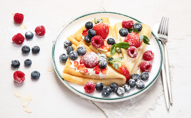 Healthy breakfast, homemade traditional crepes or pancakes
