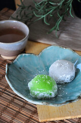 Japanese Dessert Daifuku with Japanese Tea on Wooden Background