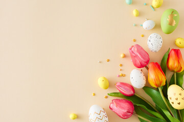 Fototapeta na wymiar Easter decor concept. Top view photo of white yellow green eggs sprinkles and tulips flowers on isolated beige background with copyspace