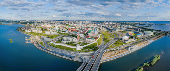 Beautiful panoramic summer picture of Kazan kremlin on the sunset, Tatarstan, Russia. Capital of the Republic of Tatarstan. Buildings and landmark line with sunny weather. Panorama of the sights.