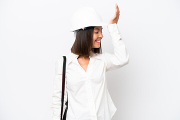 Young architect woman with helmet and holding blueprints isolated on white background has realized something and intending the solution