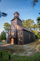 Fototapeta premium Wooden church of St. Marcin Bishop in Stara Wisniewka, Greater Poland Voivodeship, Poland