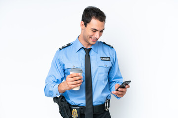 Young police caucasian man isolated on white background holding coffee to take away and a mobile