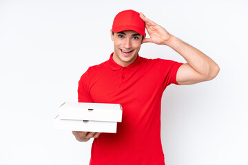 Pizza delivery caucasian man with work uniform picking up pizza boxes isolated on white background...