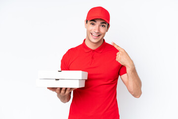 Pizza delivery caucasian man with work uniform picking up pizza boxes isolated on white background...