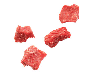 Pieces of raw beef meat falling and isolated on white and transparent background. Slices of cutted...