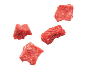 Pieces of raw beef meat falling and isolated on white and transparent background. Slices of cutted red meat, PNG