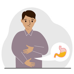 The concept of pain in the abdomen. The man holds his stomach with both hands. Problems with the stomach or digestion.