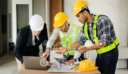 three colleagues discussing data working and tablet, laptop with on on architectural project at construction site at desk in office