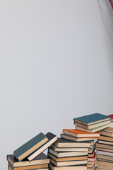 many books stacked in the library on a white background science knowledge reading