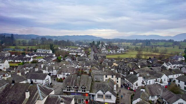 Drone, aerial footage of the historic village of Hawkshead a ancient town in the Lake District, Cumbria. The village is still the same collection of tiny houses, and squares