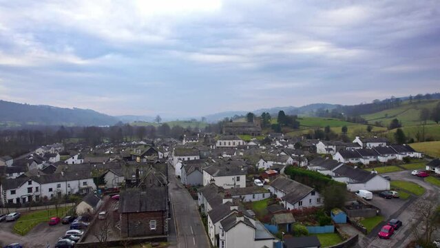 Drone, aerial footage of the historic village of Hawkshead a ancient town in the Lake District, Cumbria. The village is still the same collection of tiny houses, and squares