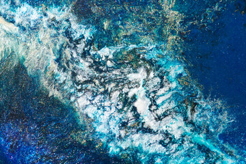Fototapeta na wymiar Luxury abstract background, liquid art. Blue alcohol ink with golden paint streaks, water surface, marble texture