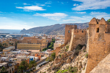 Beautifu castle walls and palm tree gardens at the Conjunto Monumental de la Alcazaba de Almería