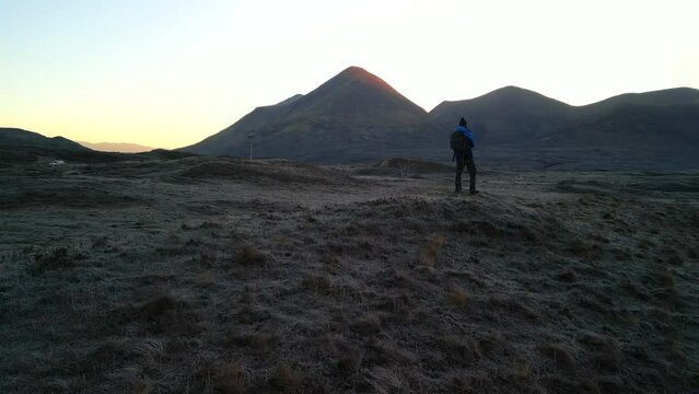 Mountain range silhouette at dawn Cuillin on the Isle of Skye Scotland