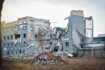 Fototapeta premium Broken Destroyed Building by War in Ukraine