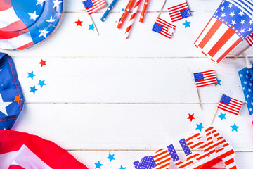 Happy Labor Day, Presidents Day, Fourth of July Independent Day, Memorial day, Columbus day background. White wooden background with USA flag color paper fans and decorations, party accessories