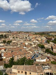 Fototapeta na wymiar This photo captures a bird's eye view of the historic buildings in Toledo, Spain. The image is ideal for those looking to showcase the unique character and heritage of Toledo