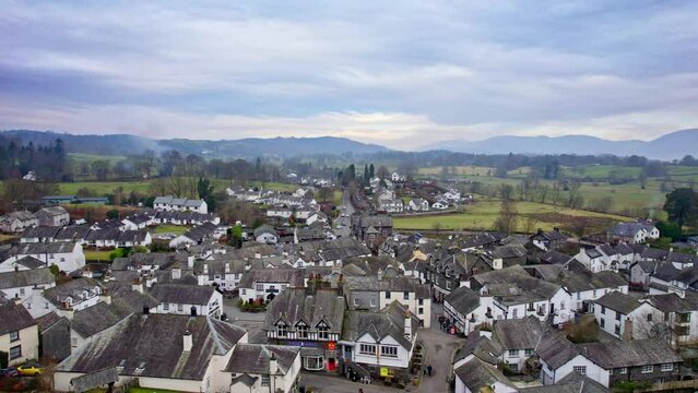 Drone, aerial footage of the historic village of Hawkshead a ancient town in the Lake District, Cumbria. The village is still the same collection of tiny houses, and squares
