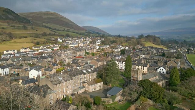 Cinematic aerial footage of Sedbergh village, the ideal place to escape to at any time of year. Come alone or with your partner or family for relaxing days out or week-long getaways.