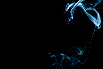 Blue smoke on a black background.