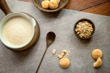 cookies and morning drink (coffee, milk or tea) in light natural envoronment, kinfolk style breakfast. High quality photo