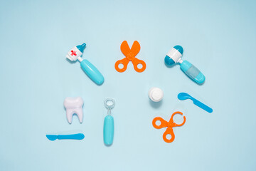 Various medical supplies on blue background. Flat lay