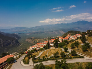 Aerial view Pythia Delphi Ancient by drone. Summer Greece. Panorama.