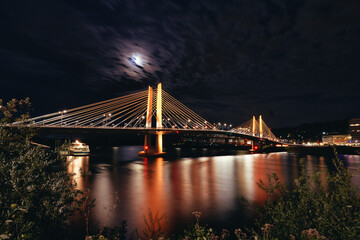 Night view of the bridge over the river Daugava in Riga, Latvia