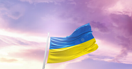 Waving Flag of Ukraine in Blue Sky. The symbol of the state on wavy cotton fabric.