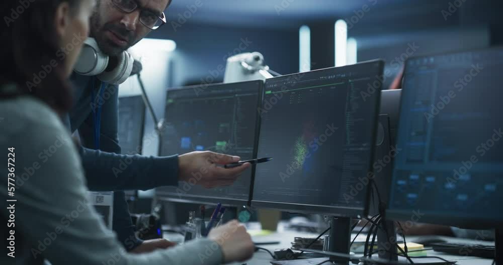 Fototapete Team Leader Having a Conversation with a Female Software Engineer. Team Working on an Artificial Intelligence Neural Network. Colleagues Mapping Out Issues in a Digital Big Data Visualization Diagram
