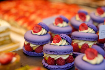 Raspberry Macaron in a London pastry showcase