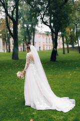 Beautiful and stylish romantic young couple in love, wedding day, love, walk in a beautiful park, nature, autumn,