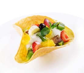 Vanilla ice cream in waffle basket isolated on white